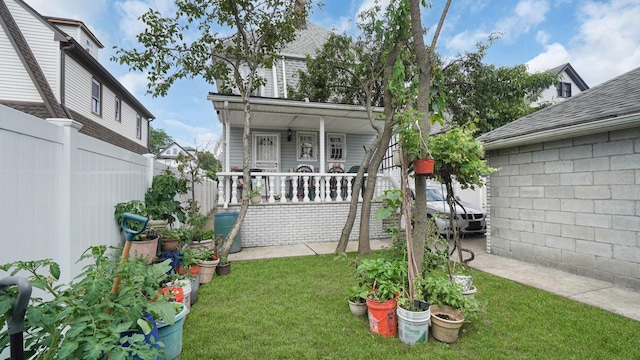 89-10 189th St, Hollis, NY 11423 - back of property with a porch