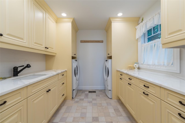 4510 Peconic Bay Blvd, Laurel, NY 11948 - laundry room with washer and clothes dryer, cabinet space, and recessed lighting