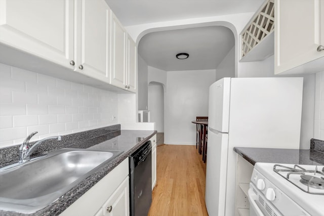 63-60 102nd St Unit A8, Rego Park, NY 11374 - kitchen with dishwasher, arched walkways, white cabinetry, light wood-type flooring, and backsplash
