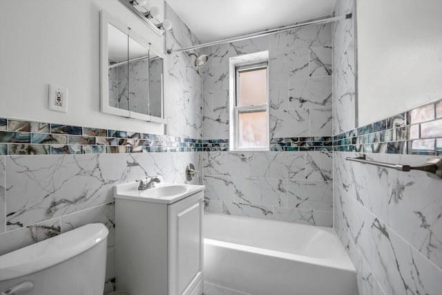 63-60 102nd St Unit A8, Rego Park, NY 11374 - bathroom with tile walls, vanity, and tub / shower combination
