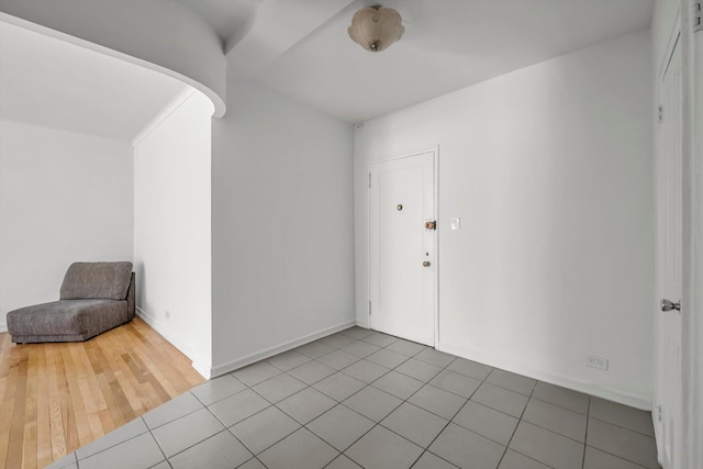 63-60 102nd St Unit A8, Rego Park, NY 11374 - foyer featuring tile patterned flooring and baseboards