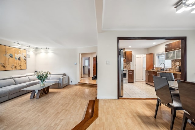 213-09 64th Ave, Oakland Gardens, NY 11364 - living room with light wood-style flooring and baseboards