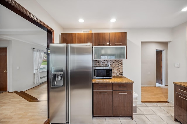 213-09 64th Ave, Oakland Gardens, NY 11364 - kitchen with stainless steel appliances, radiator heating unit, tasteful backsplash, recessed lighting, and modern cabinets