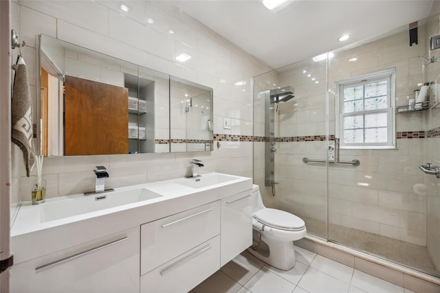 213-09 64th Ave, Oakland Gardens, NY 11364 - bathroom featuring a stall shower, tile walls, tile patterned floors, double vanity, and backsplash