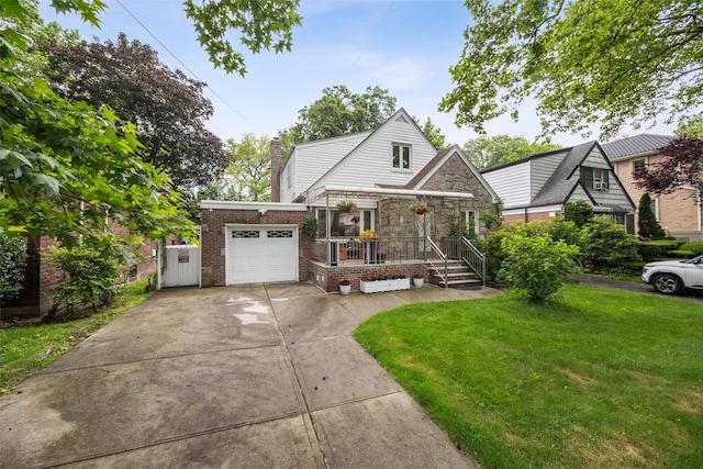 213-09 64th Ave, Oakland Gardens, NY 11364 - view of front facade featuring a front yard, brick siding, covered porch, an attached garage, and driveway