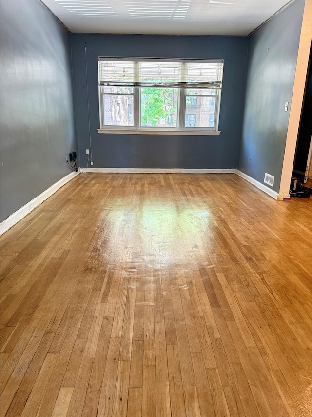 1319 Hicks St, Bronx, NY 10469 - spare room with wood finished floors and baseboards