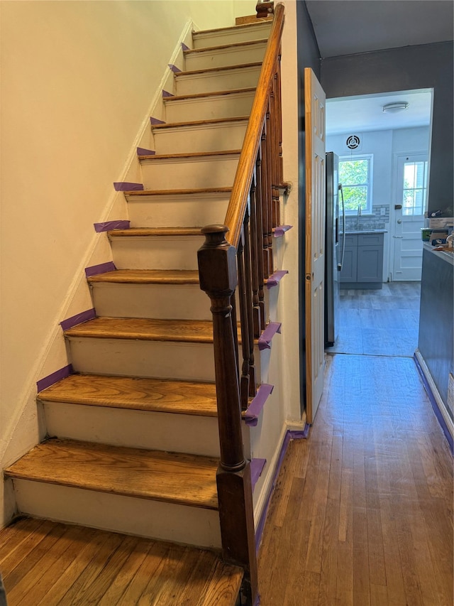 1319 Hicks St, Bronx, NY 10469 - stairs featuring hardwood / wood-style flooring