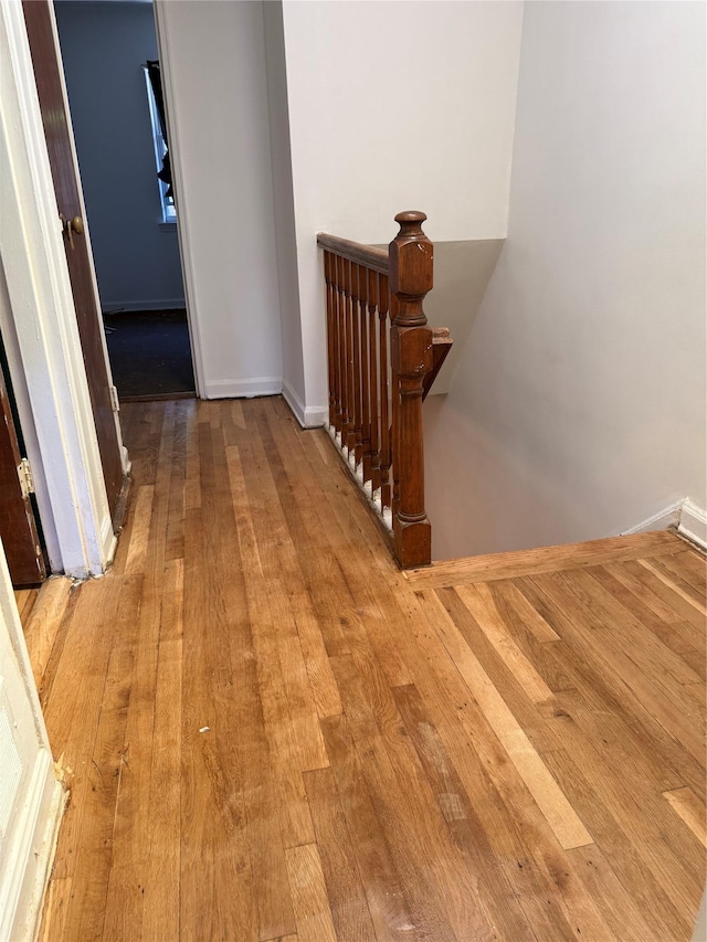 1319 Hicks St, Bronx, NY 10469 - hall with wood-type flooring and an upstairs landing