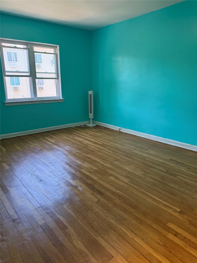 1319 Hicks St, Bronx, NY 10469 - unfurnished room featuring wood-type flooring and baseboards
