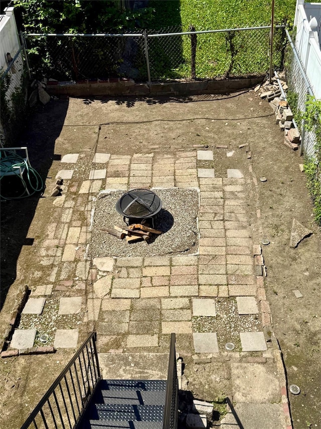 1319 Hicks St, Bronx, NY 10469 - view of patio with a fire pit