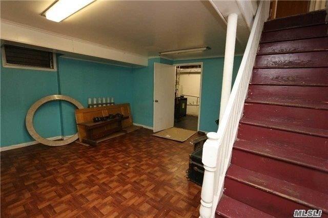 85-24 Eton St, Jamaica Estates, NY 11432 - finished below grade area featuring stairs and baseboards