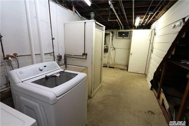 85-24 Eton St, Jamaica Estates, NY 11432 - washroom featuring washer / clothes dryer