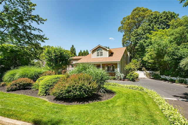 122 Cambon Ave, Saint James, NY 11780 - view of front of property featuring a front yard