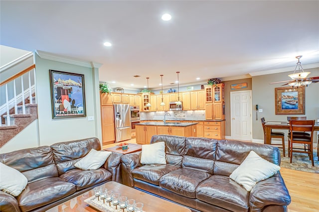 122 Cambon Ave, Saint James, NY 11780 - living area featuring ornamental molding, light wood finished floors, stairway, a ceiling fan, and recessed lighting