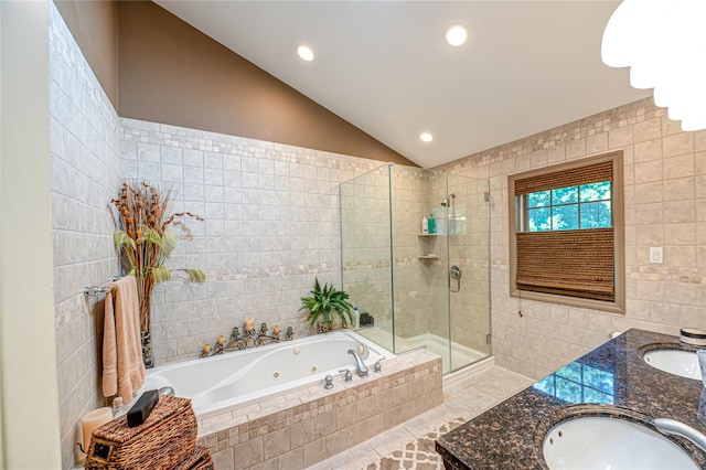 122 Cambon Ave, Saint James, NY 11780 - bathroom with tile walls, vaulted ceiling, a whirlpool tub, a stall shower, and double vanity