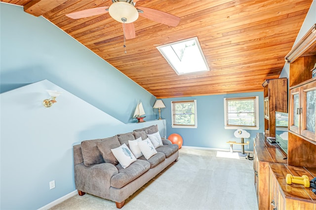 122 Cambon Ave, Saint James, NY 11780 - carpeted living room featuring lofted ceiling, wood ceiling, a skylight, and ceiling fan
