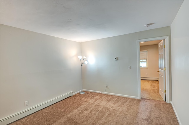 122 Cambon Ave, Saint James, NY 11780 - empty room with baseboard heating, light carpet, and a smoke detector