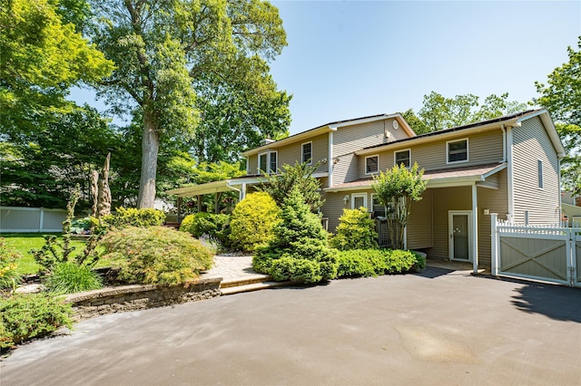 122 Cambon Ave, Saint James, NY 11780 - view of front facade featuring a gate