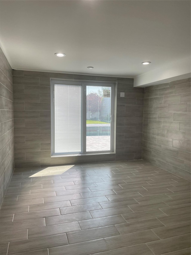 503 Nassau Ave, Freeport, NY 11520 - unfurnished room featuring wood finish floors and recessed lighting