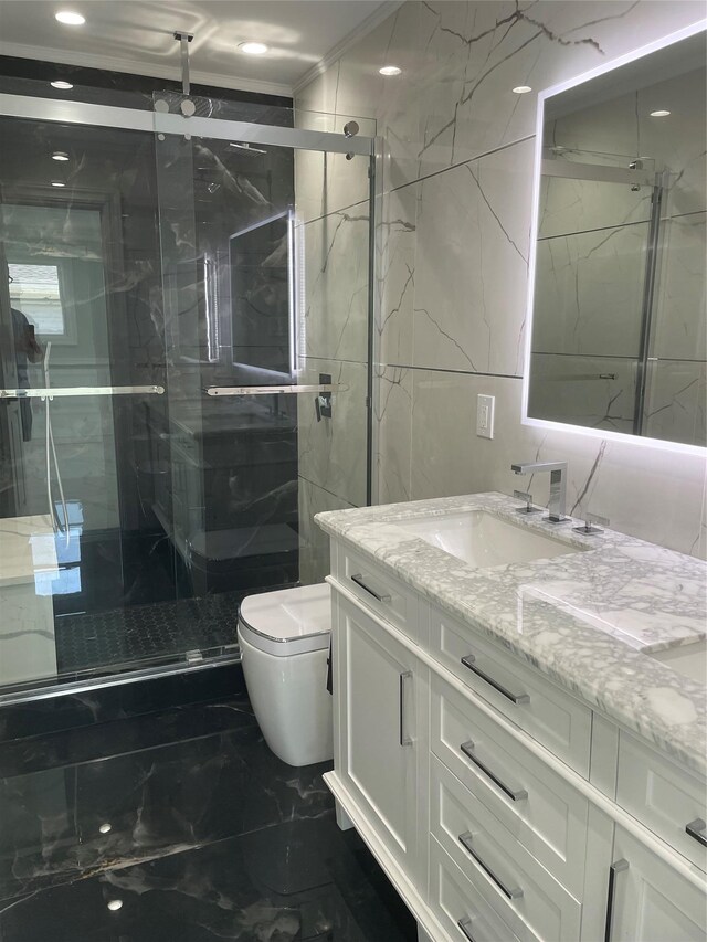 503 Nassau Ave, Freeport, NY 11520 - bathroom featuring marble tiled flooring, vanity, tile walls, a marble finish shower, and recessed lighting