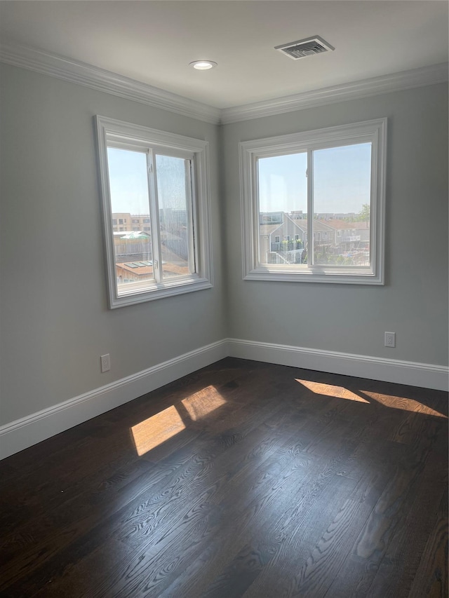 503 Nassau Ave, Freeport, NY 11520 - empty room with crown molding, dark wood-style floors, and recessed lighting