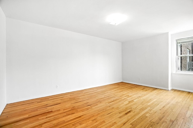 1255 N Ave Unit 2F, New Rochelle, NY 10804 - empty room featuring light wood-style floors