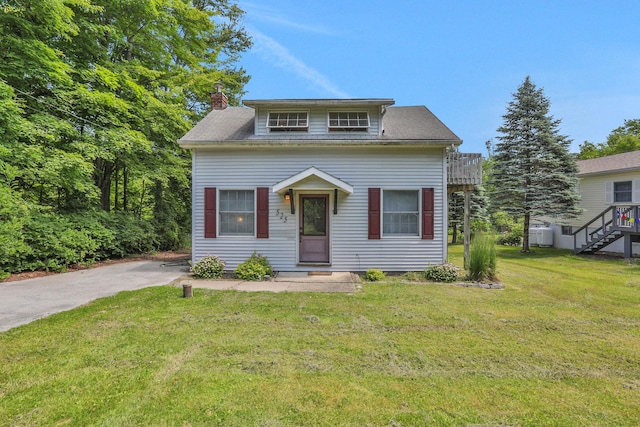 525 Myrtle Ave, Gardiner, NY 12589 - view of front of property with a chimney and a front yard