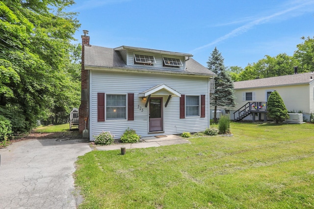525 Myrtle Ave, Gardiner, NY 12589 - bungalow with a chimney, a front yard, and stairway