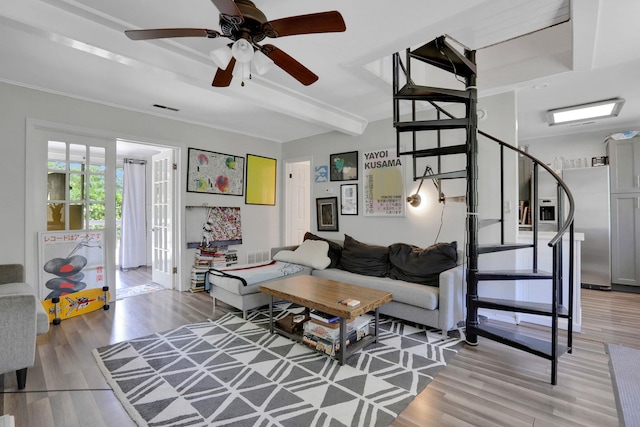 525 Myrtle Ave, Gardiner, NY 12589 - living area featuring stairway, light wood finished floors, a ceiling fan, and beam ceiling