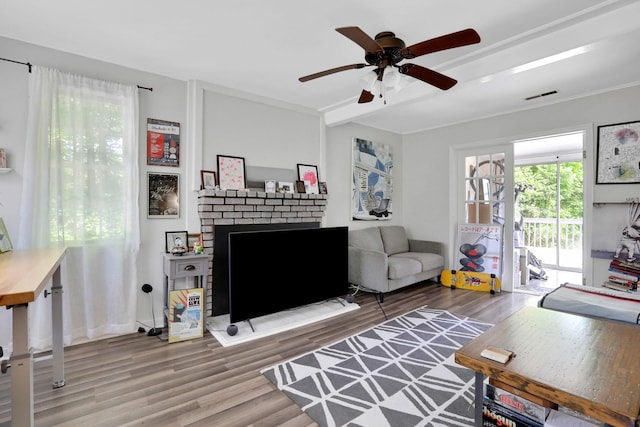 525 Myrtle Ave, Gardiner, NY 12589 - living room with wood finished floors, ceiling fan, and a fireplace