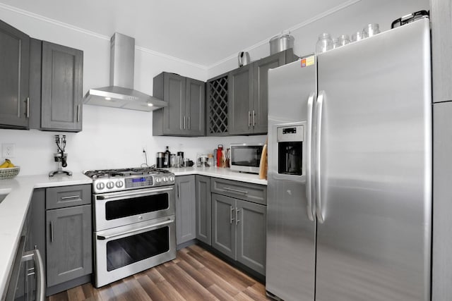 525 Myrtle Ave, Gardiner, NY 12589 - kitchen with stainless steel appliances, wall chimney exhaust hood, crown molding, gray cabinets, and light countertops