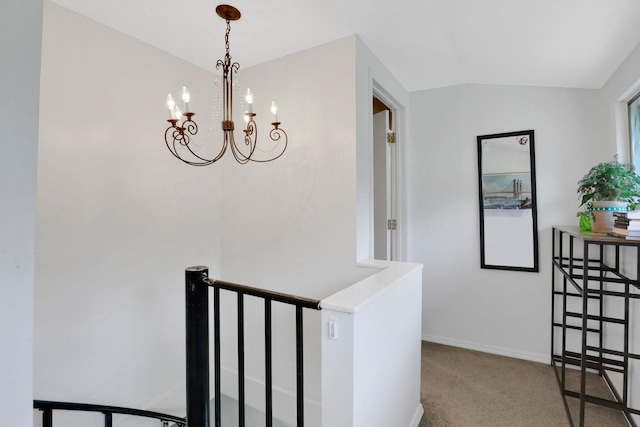 525 Myrtle Ave, Gardiner, NY 12589 - hall featuring carpet floors, a chandelier, vaulted ceiling, and an upstairs landing