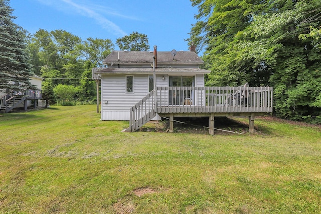 525 Myrtle Ave, Gardiner, NY 12589 - back of house featuring a wooden deck, a lawn, stairs, and a chimney