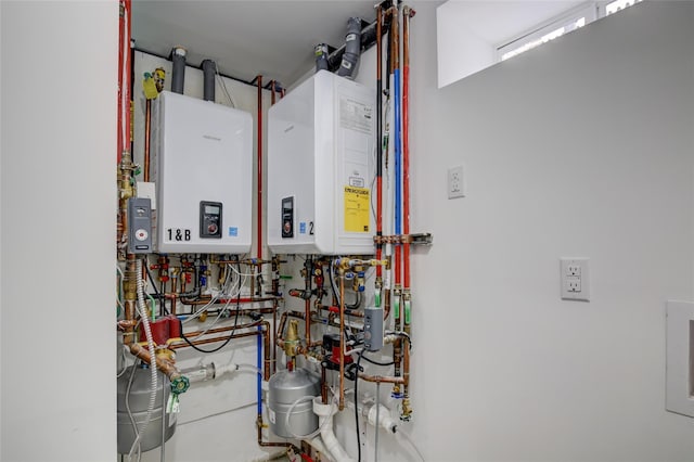 89-25 127th St, Richmond Hill, NY 11418 - utility room with tankless water heater