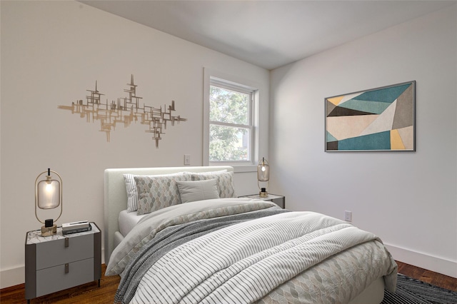 89-25 127th St, Richmond Hill, NY 11418 - bedroom with dark wood-style flooring and baseboards