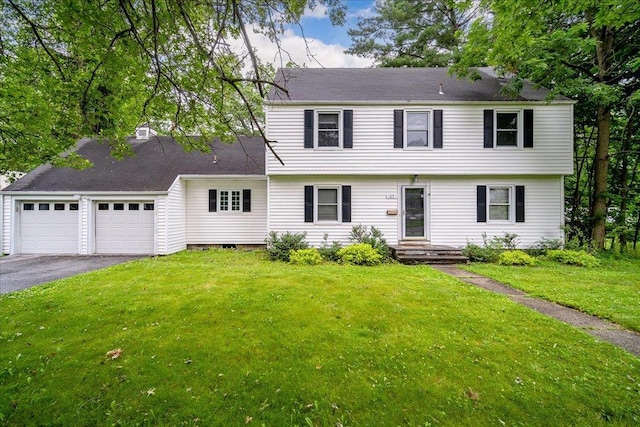 17 Seaman Rd, Poughkeepsie, NY 12601 - colonial home with a garage, driveway, and a front lawn