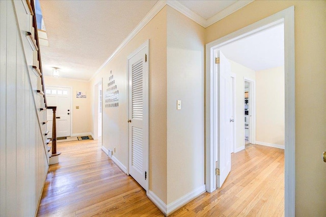 17 Seaman Rd, Poughkeepsie, NY 12601 - corridor featuring light wood-style floors, crown molding, and stairway