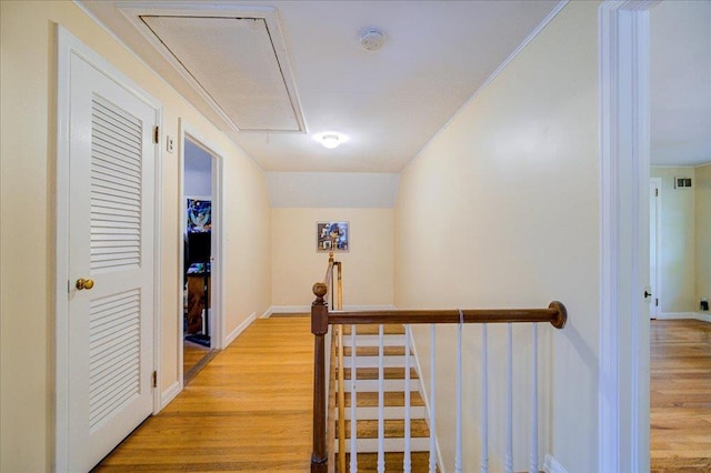 17 Seaman Rd, Poughkeepsie, NY 12601 - hall with attic access, an upstairs landing, and light wood finished floors