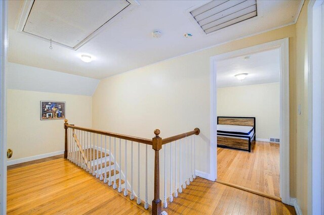 17 Seaman Rd, Poughkeepsie, NY 12601 - hallway featuring attic access, an upstairs landing, and wood-type flooring