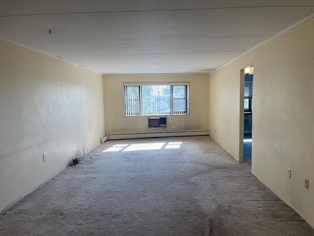 100 Clinton Ave Unit 3P, Mineola, NY 11501 - empty room featuring a baseboard radiator, carpet flooring, and crown molding