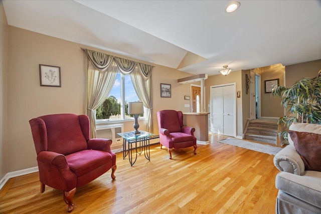 17 Acorn Rd, East Rockaway, NY 11518 - sitting room featuring light wood-style flooring, ornate columns, and recessed lighting