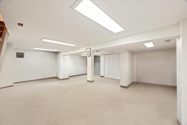 17 Acorn Rd, East Rockaway, NY 11518 - finished basement with light colored carpet and baseboards