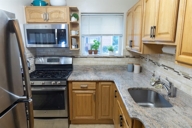 304 Fenimore Rd Unit 7A, Mamaroneck, NY 10543 - kitchen with appliances with stainless steel finishes, tasteful backsplash, and light stone counters
