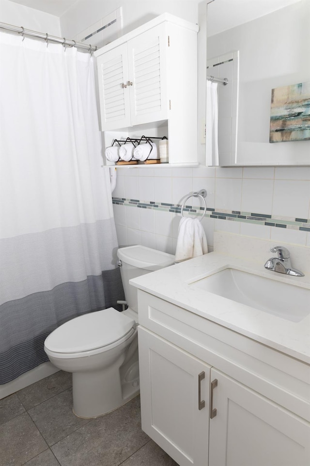 304 Fenimore Rd Unit 7A, Mamaroneck, NY 10543 - full bathroom with vanity, decorative backsplash, tile walls, tile patterned floors, and curtained shower