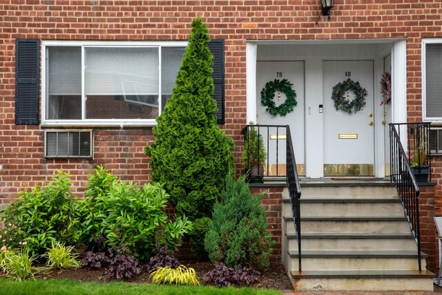 304 Fenimore Rd Unit 7A, Mamaroneck, NY 10543 - property entrance featuring brick siding