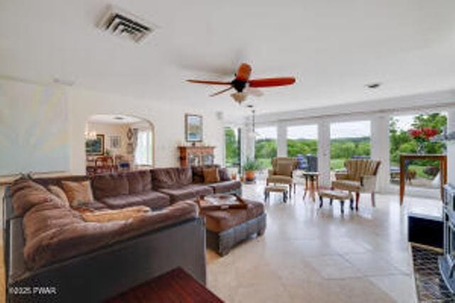 312 E Ann St, Milford, PA 18337 - living area featuring arched walkways and a ceiling fan