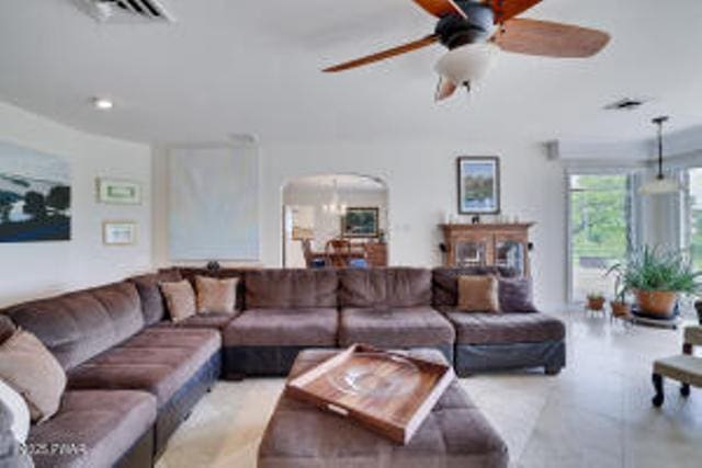 312 E Ann St, Milford, PA 18337 - living area featuring arched walkways and ceiling fan