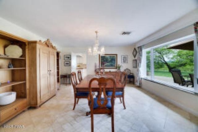 312 E Ann St, Milford, PA 18337 - dining room with a chandelier