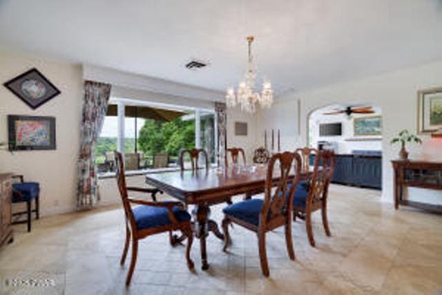 312 E Ann St, Milford, PA 18337 - dining space with a chandelier and a ceiling fan