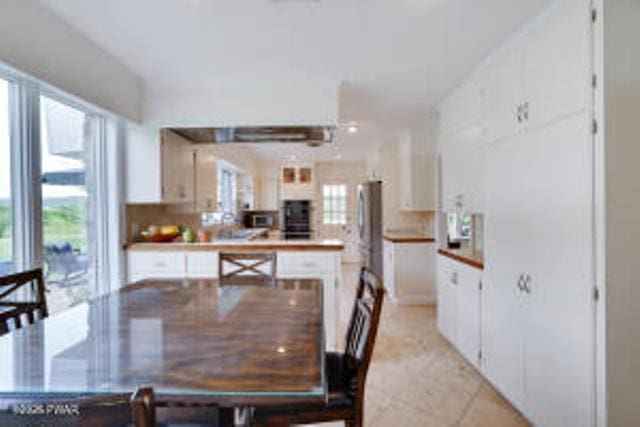 312 E Ann St, Milford, PA 18337 - dining area with light tile patterned floors